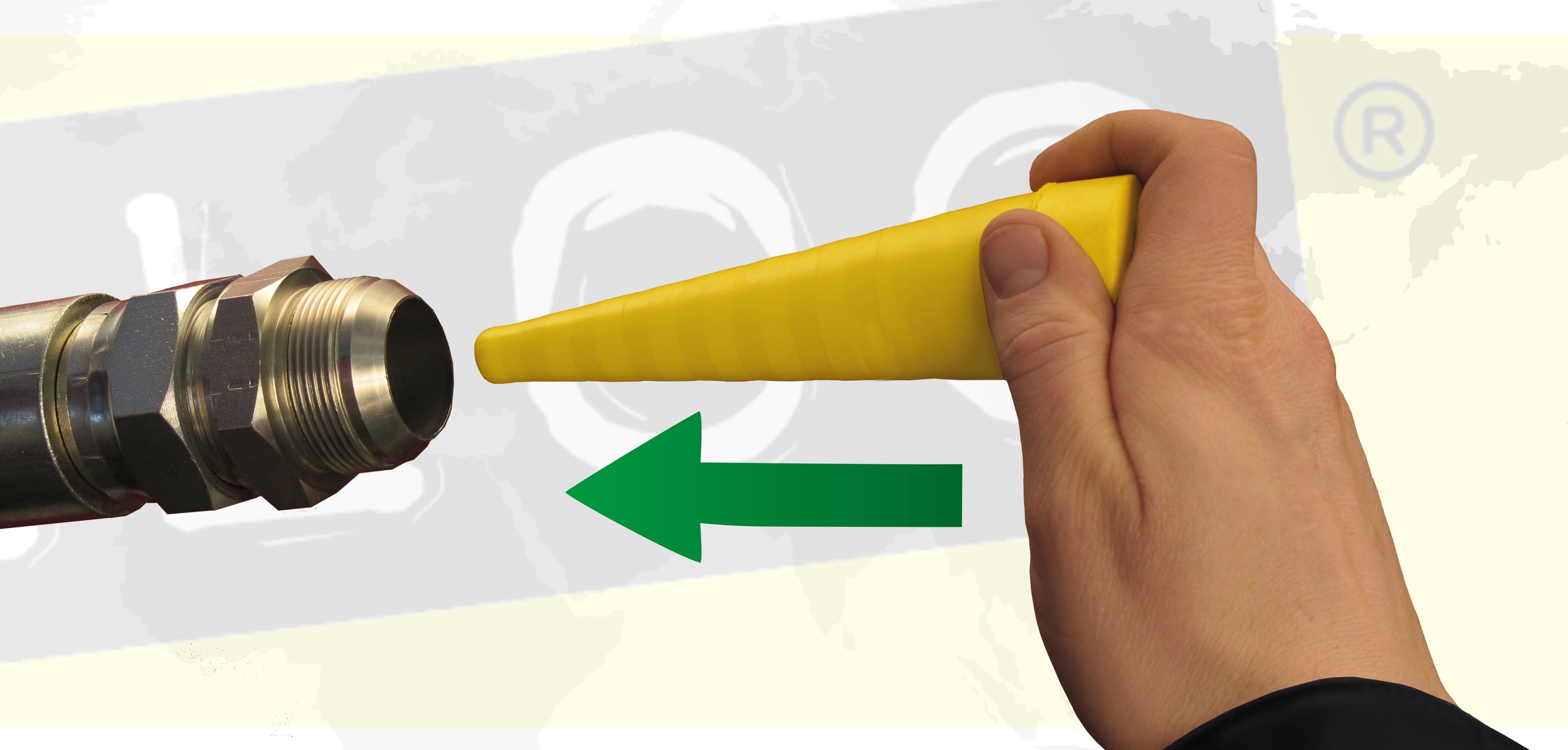 Sealing a hydraulic hose with a Yelloc plug for instant leak protection.
